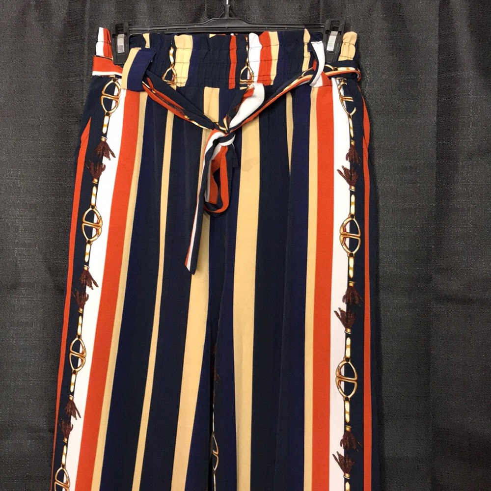 Stripe down, dressy pants.